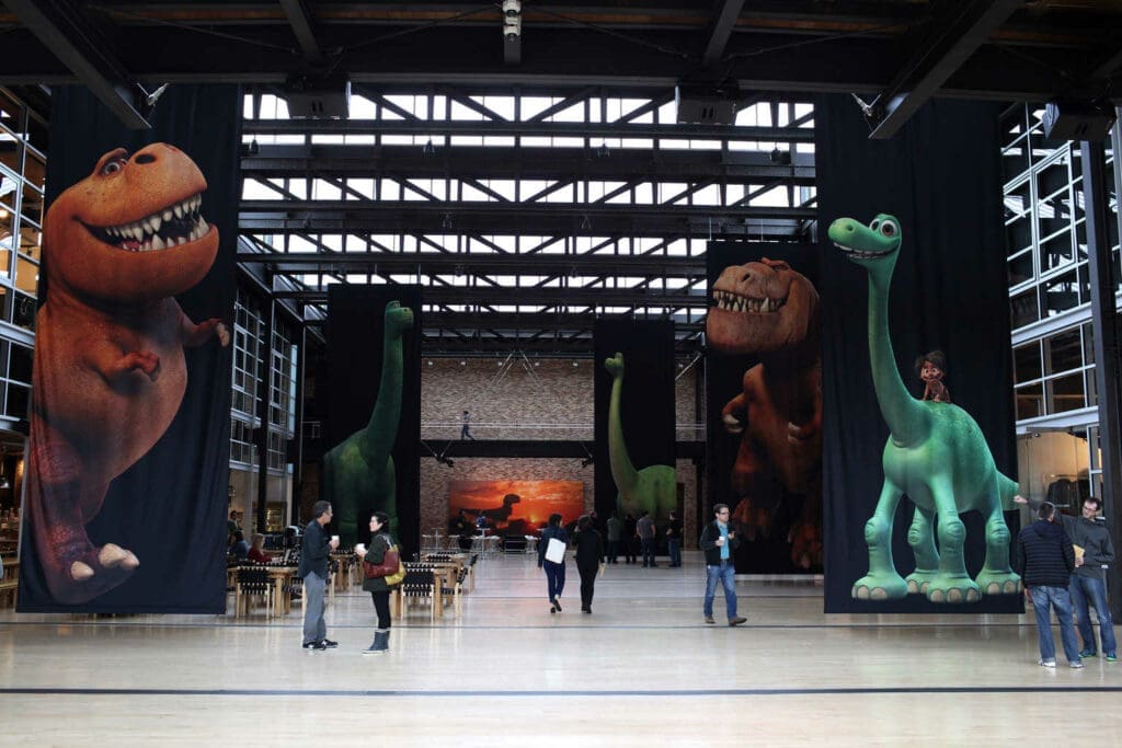 The atrium, with The Good Dinosaur artwork, as seen on September 30, 2015 at Pixar Animation Studios in Emeryville, Calif. (Photo by Deborah Coleman / Pixar)